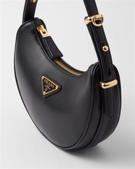 prada acarpe|prada arque leather bag.